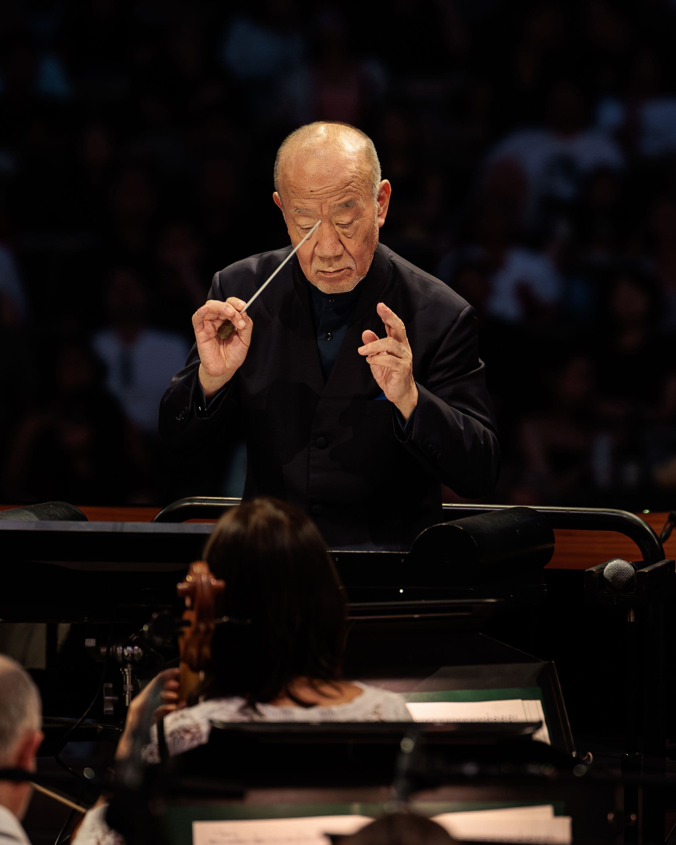 Joe Hisaishi conducts the Los Angeles Philharmonic from the center of the Hollywood Bowl stage