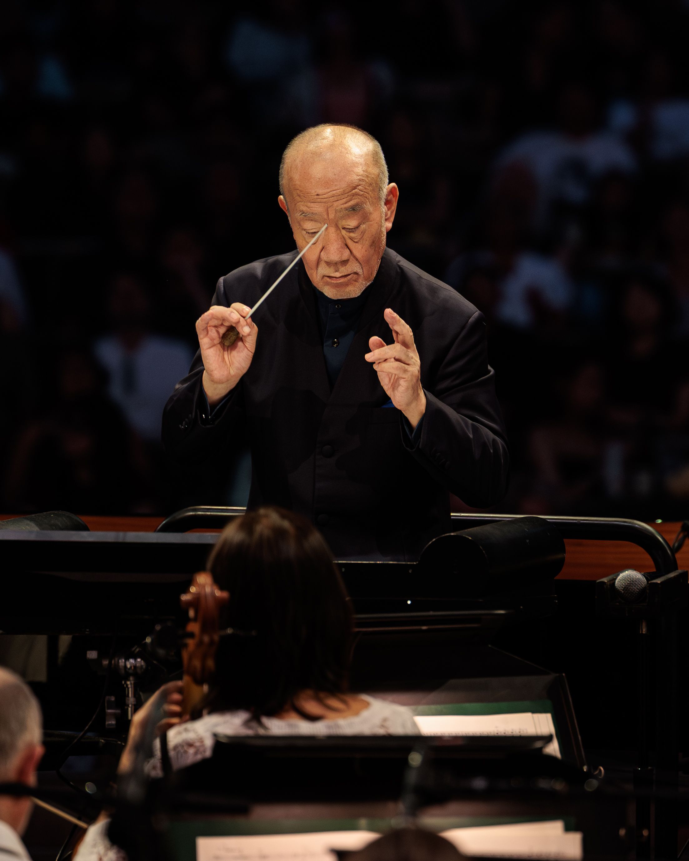 Joe Hisaishi conducts the Los Angeles Philharmonic from the center of the Hollywood Bowl stage